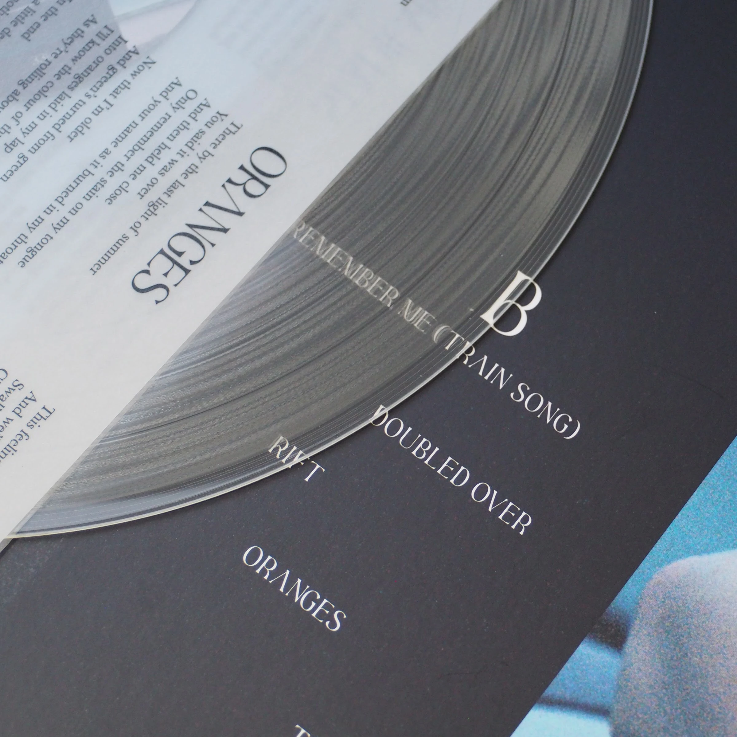 Clara Mann transparent vinyl on top of cover artwork.