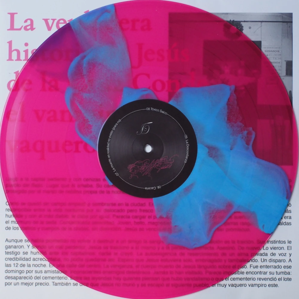 Pink vinyl record with blue color-in-color effect and black label.