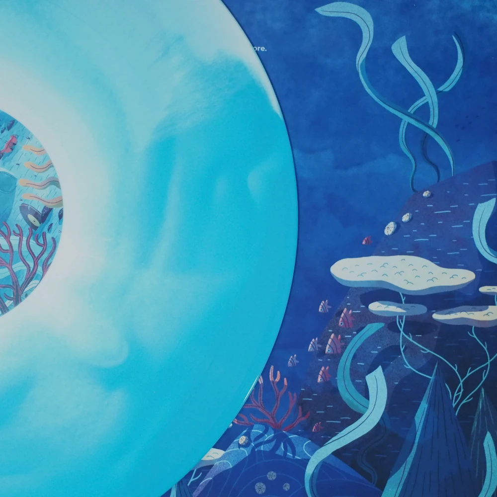 Close-up of blue swirl vinyl over deep ocean illustration.