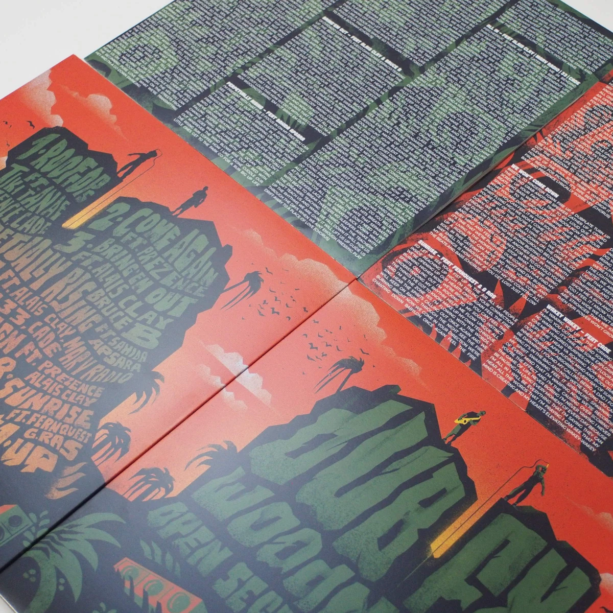 Full spread of double-sided printed inner sleeves with artwork and text.