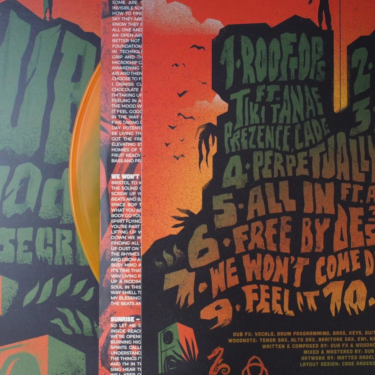 Orange vinyl edge partially pulled from illustrated outer sleeve.