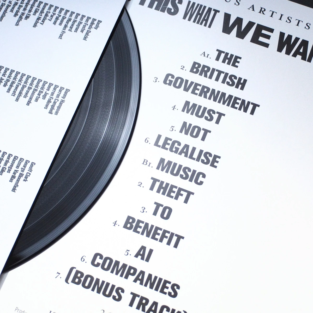 Vinyl record half-inserted into inner sleeve showing full tracklist with bold typography.