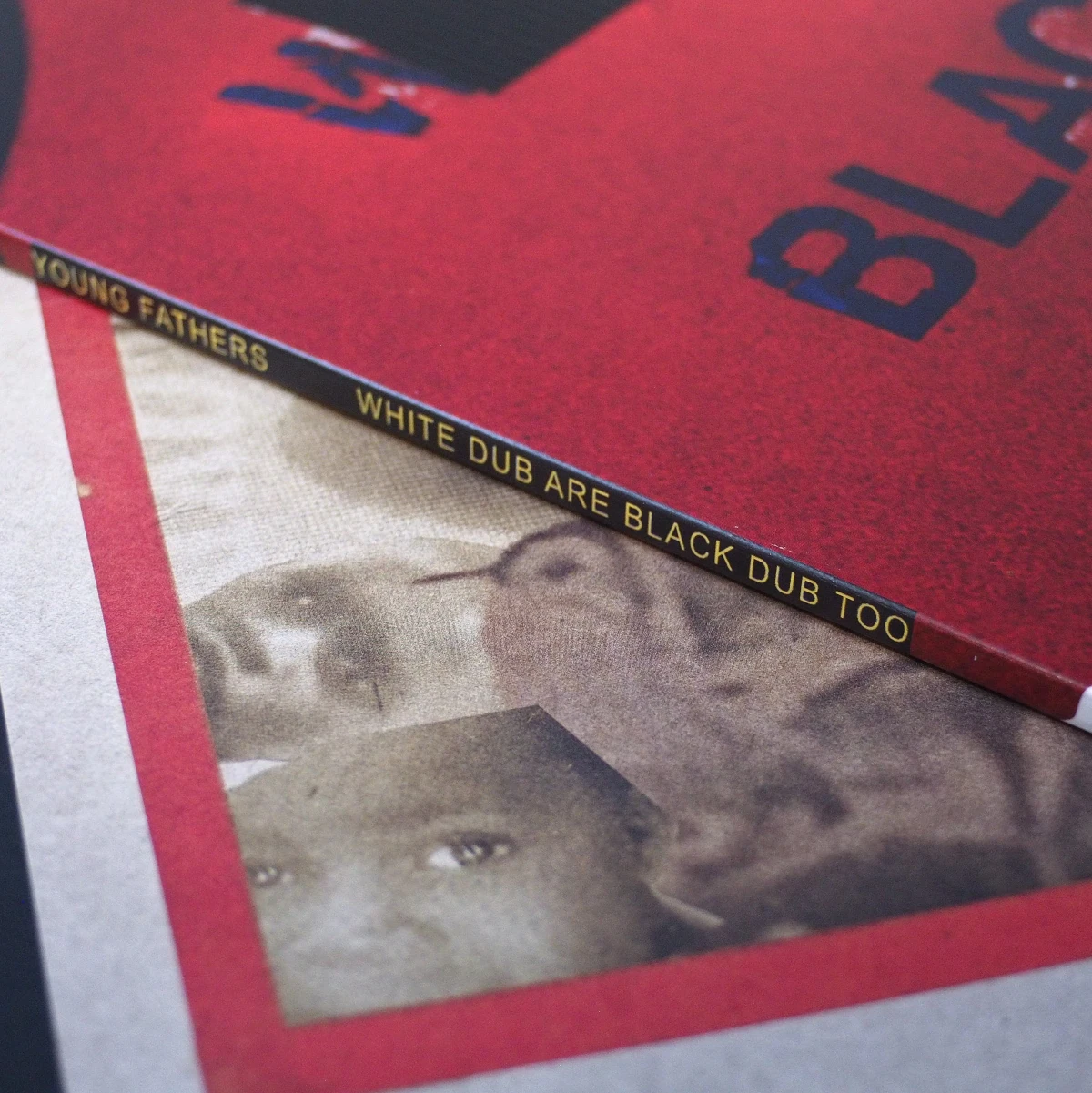 Spine text of Young Fathers vinyl sleeve.
