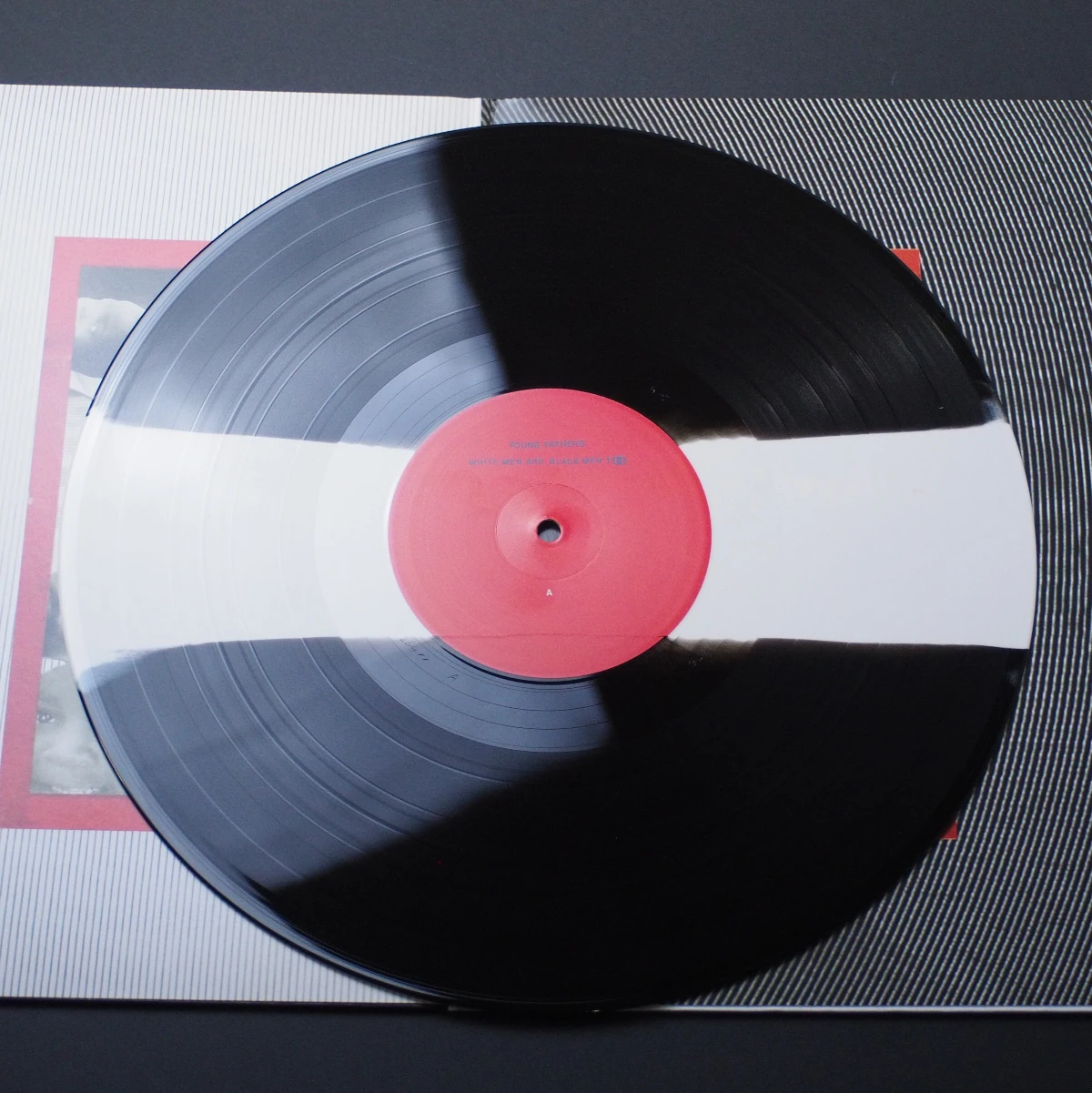 Split-color vinyl in black and white of Young Fathers album.